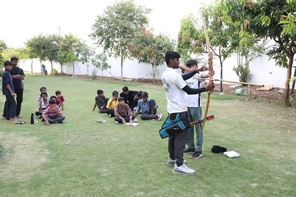 Students practicing archery