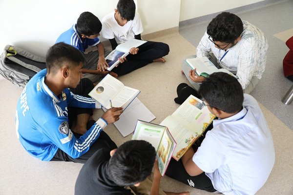 Students in circle of learning